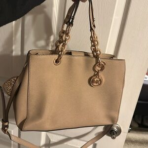 Michael Kors purse with rose gold hardware